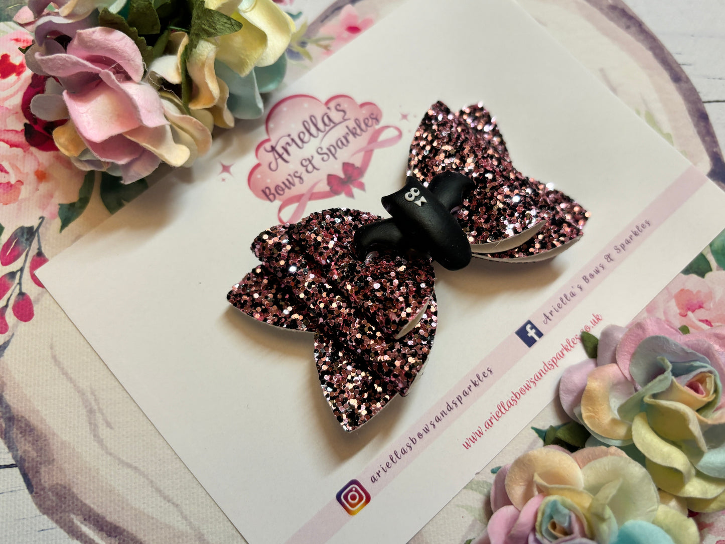 Halloween pink and black glitter bat bow